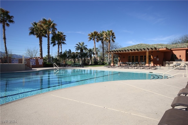 view of pool featuring a patio