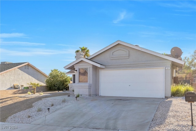 single story home with a garage