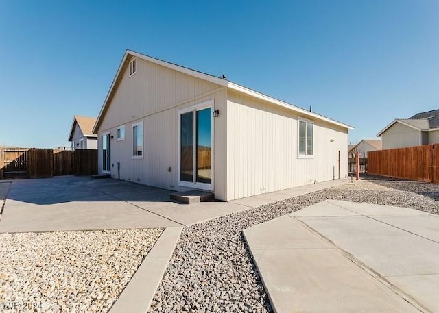 rear view of house with a patio