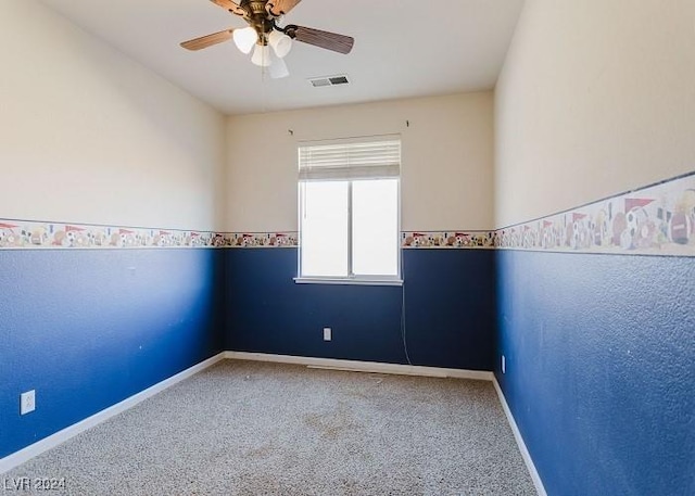 carpeted empty room with ceiling fan