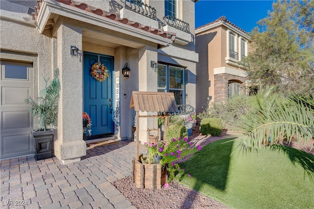 doorway to property with a balcony