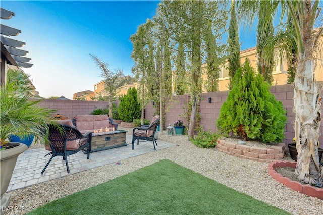 view of yard with an outdoor hangout area and a patio