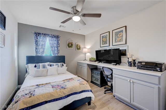 bedroom featuring light hardwood / wood-style flooring and ceiling fan