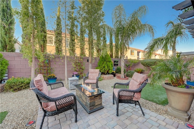 view of patio featuring an outdoor fire pit