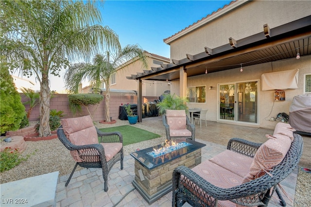 patio terrace at dusk with an outdoor fire pit