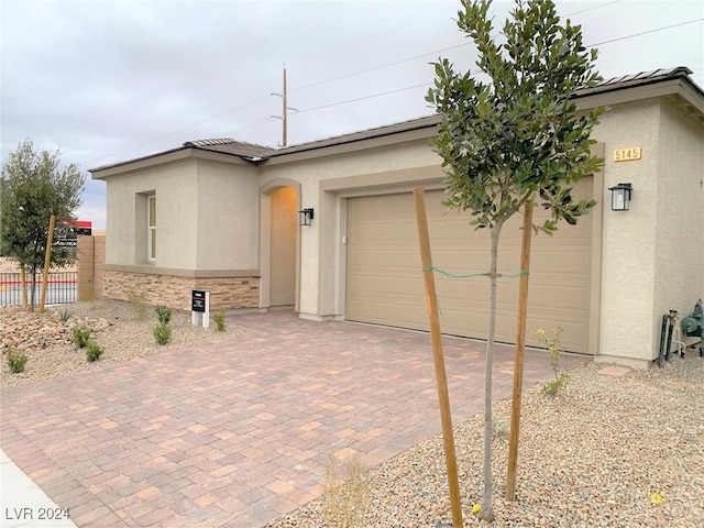 view of front of house with a garage