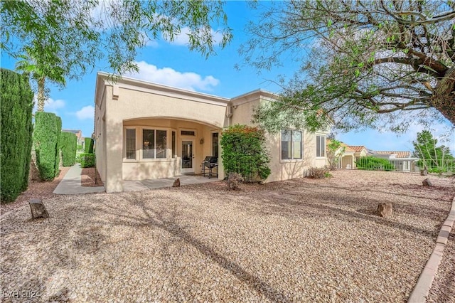 view of front of house with a patio