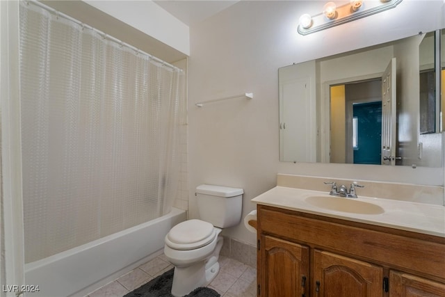 full bathroom with toilet, vanity, tile patterned floors, and shower / bathtub combination with curtain