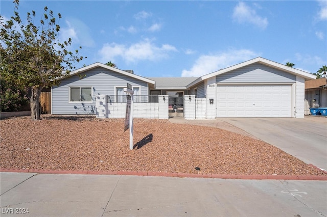 single story home featuring a garage