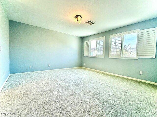 empty room featuring carpet