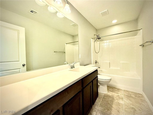 full bathroom with shower / tub combination, vanity, and toilet