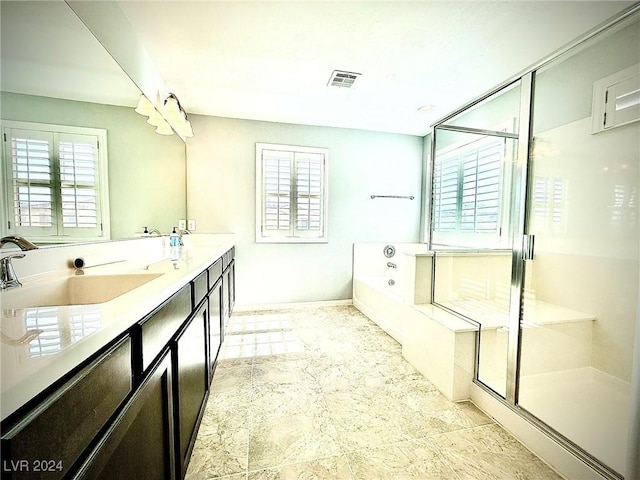 bathroom featuring vanity and plus walk in shower