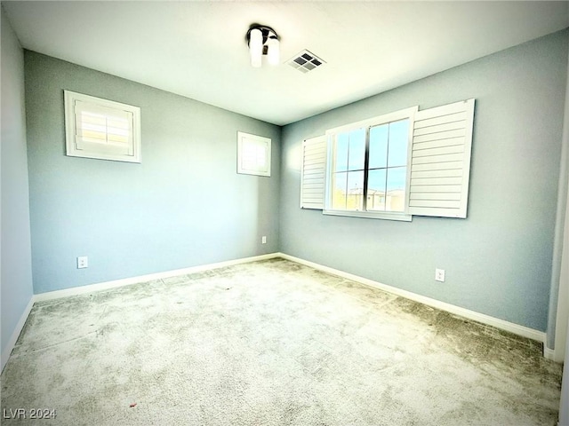 view of carpeted spare room