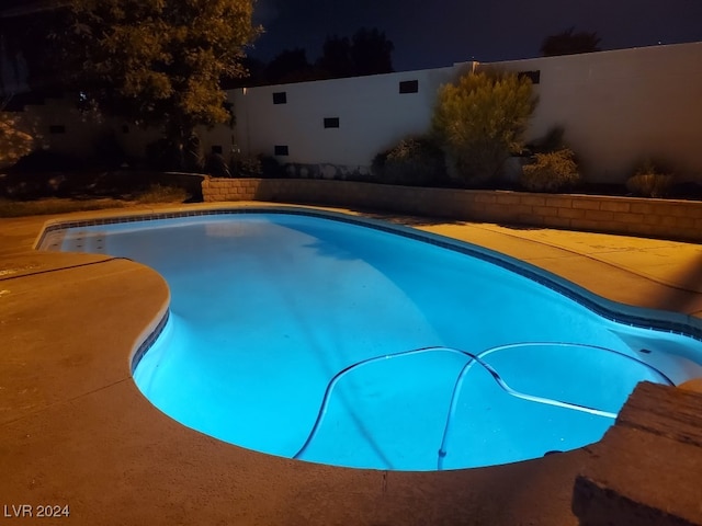 view of pool with fence and a fenced in pool