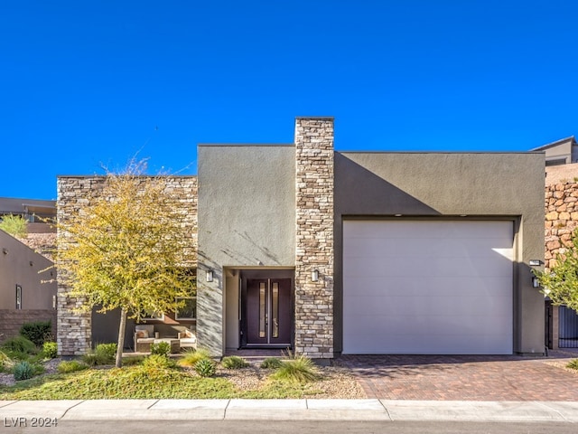 contemporary home featuring a garage