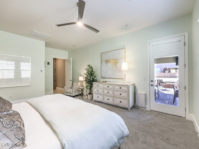 carpeted bedroom with ceiling fan and access to exterior