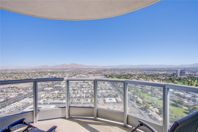 balcony featuring a mountain view