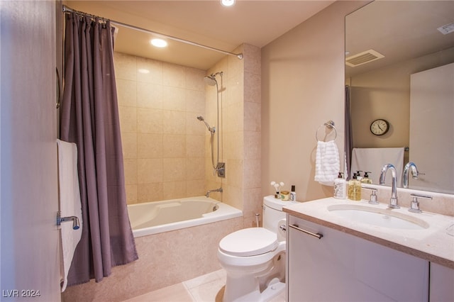 full bathroom with vanity, shower / tub combo, toilet, and tile patterned flooring