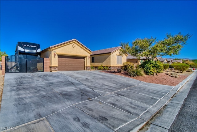 single story home with a garage