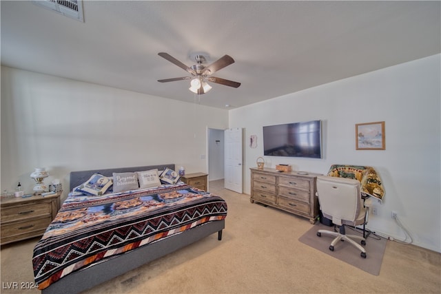 bedroom with light colored carpet and ceiling fan