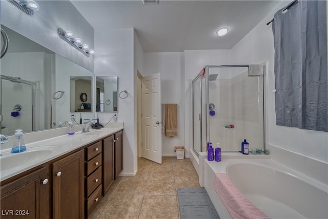 bathroom with vanity, shower with separate bathtub, and tile patterned floors