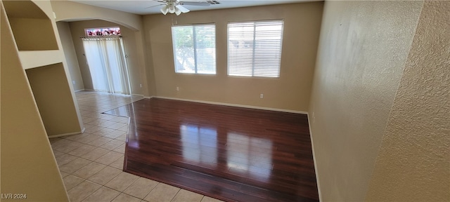 empty room featuring light hardwood / wood-style floors and ceiling fan