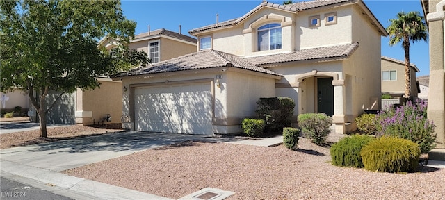 view of front of property featuring a garage