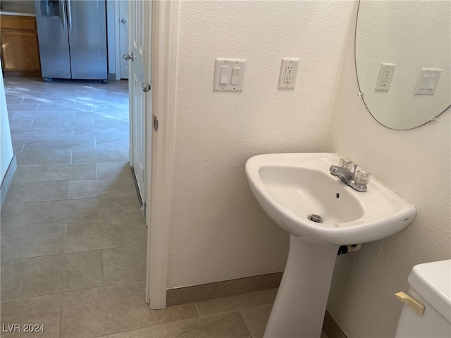 bathroom featuring toilet