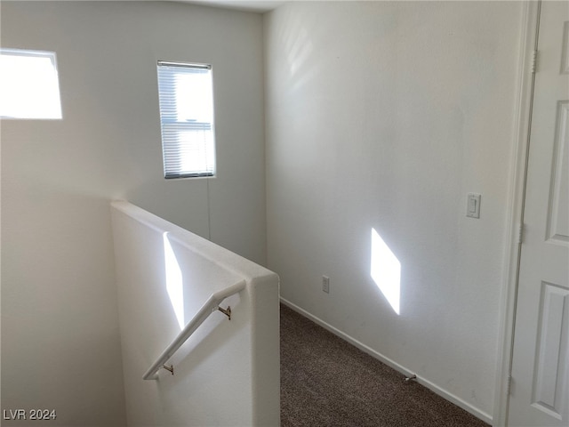 corridor featuring carpet floors