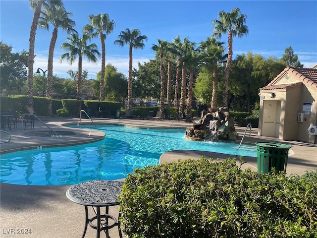 view of swimming pool with a patio