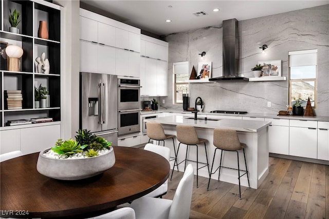 639 Spotted Falcon St, Las Vegas, NV 89138 - kitchen with a sink, open shelves, wall chimney exhaust hood, modern cabinets, and appliances with stainless steel finishes