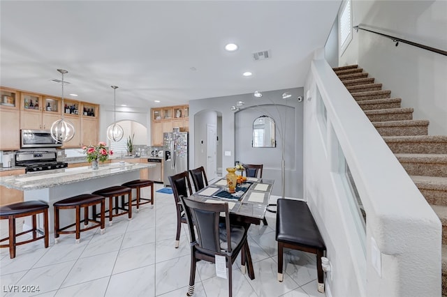 dining area with a chandelier