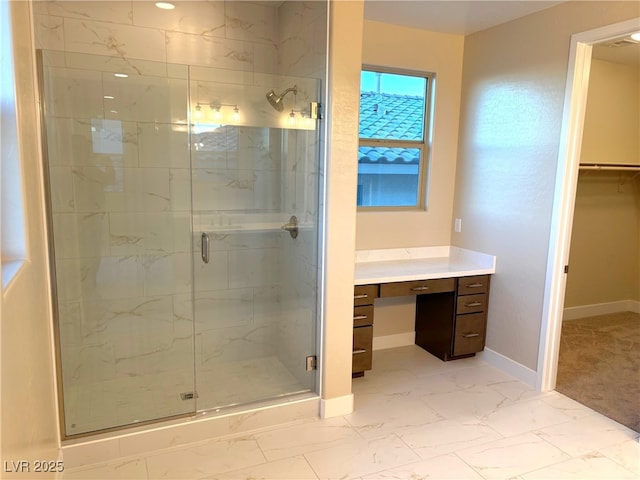 bathroom with vanity and an enclosed shower