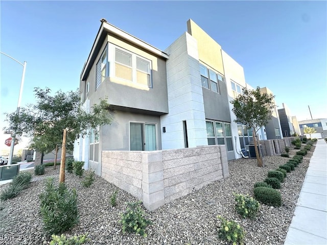 9847 Kings Glen St, Las Vegas, NV 89141 - view of home's exterior with stucco siding and central AC unit