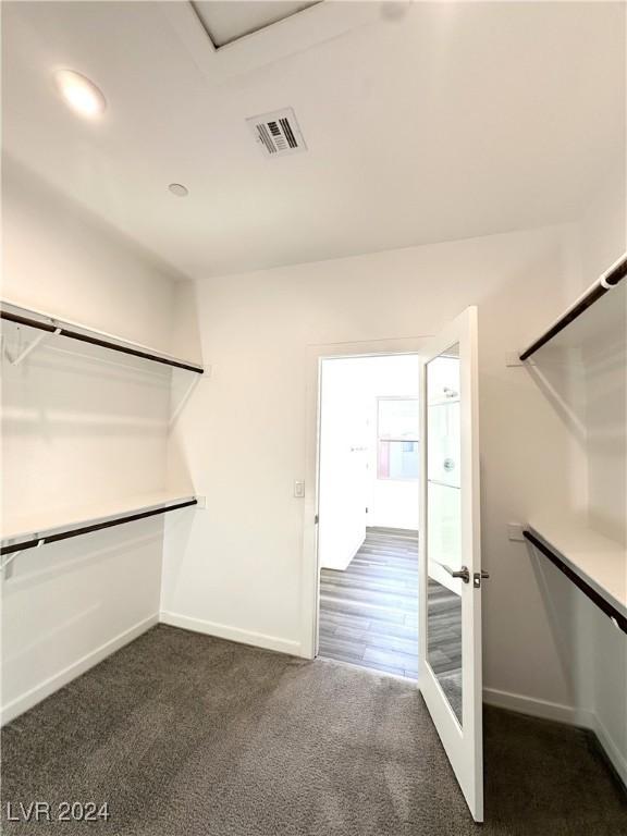 9847 Kings Glen St, Las Vegas, NV 89141 - spacious closet with dark carpet