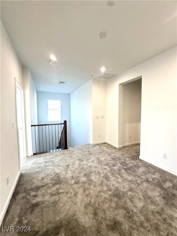 9847 Kings Glen St, Las Vegas, NV 89141 - carpeted spare room with baseboards