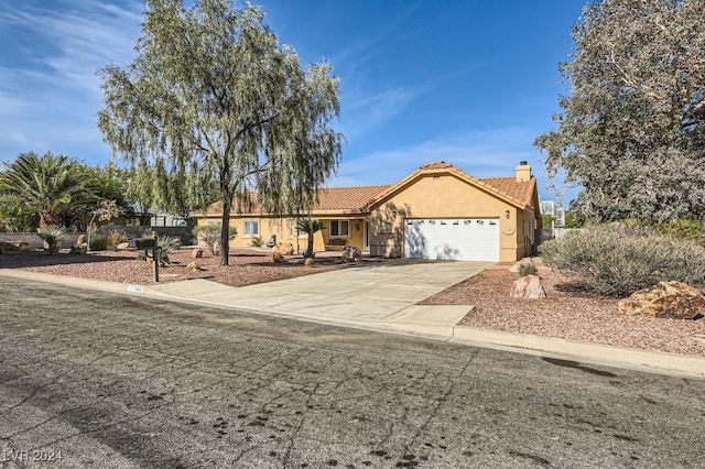 view of front of home with a garage