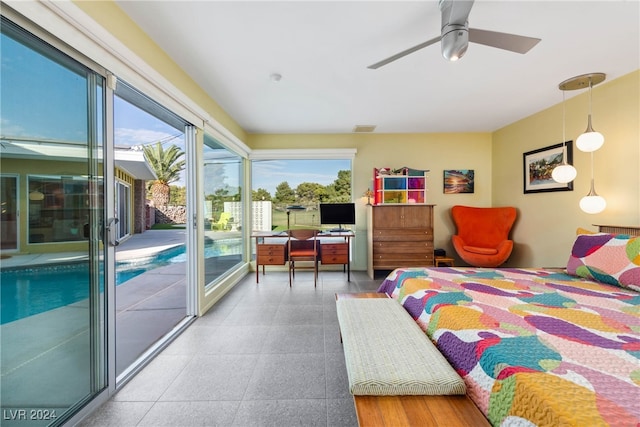 bedroom featuring access to outside and ceiling fan