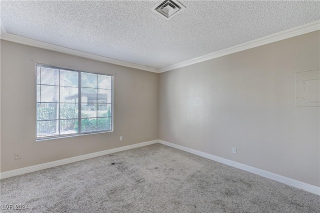 unfurnished room featuring ornamental molding, carpet floors, and a textured ceiling