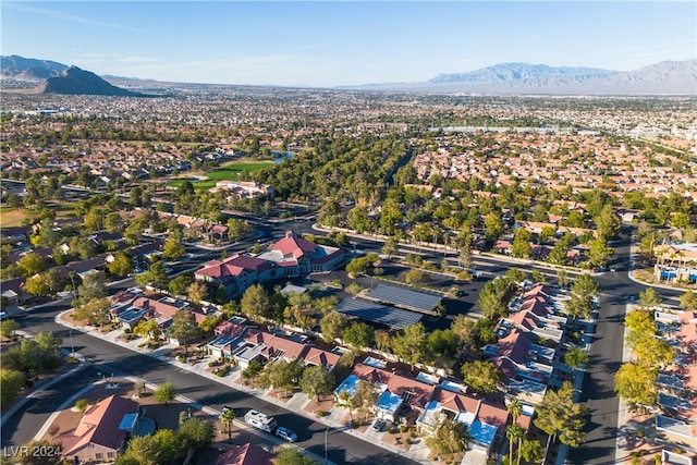 birds eye view of property featuring a mountain view