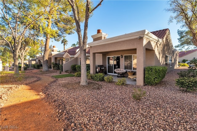 view of front facade with a patio