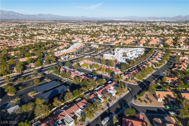 birds eye view of property featuring a mountain view