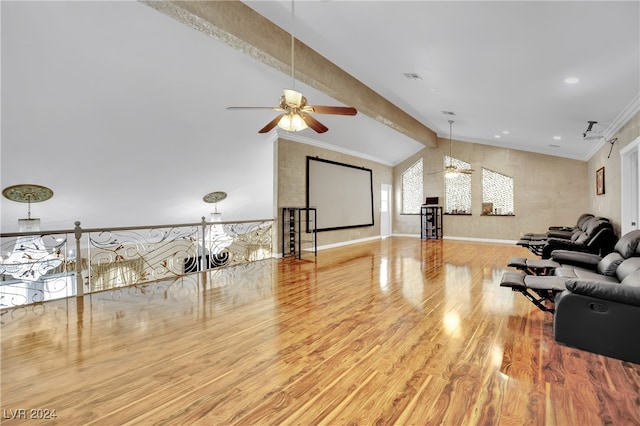 living room featuring vaulted ceiling with beams, light hardwood / wood-style flooring, ornamental molding, and ceiling fan