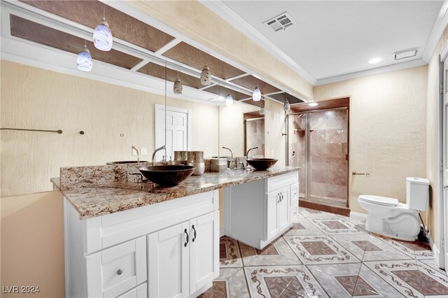 bathroom featuring toilet, crown molding, vanity, an enclosed shower, and tile patterned flooring