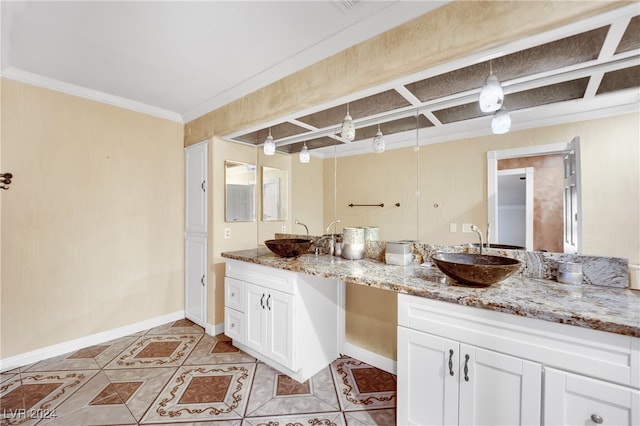 bathroom featuring vanity, ornamental molding, and tile patterned flooring