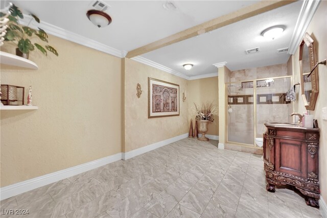 interior space with crown molding and sink