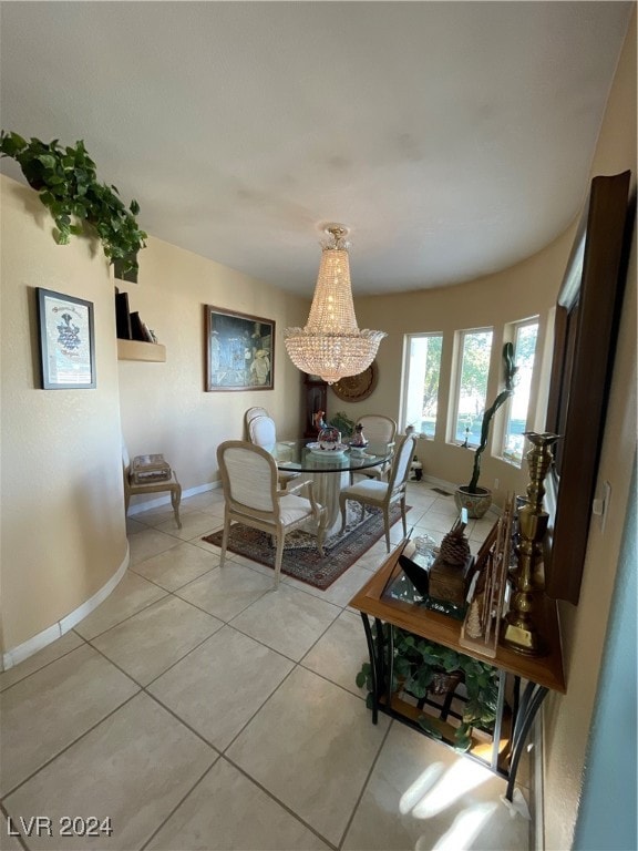 291E Madison Ave, Ely, NV 89301 - dining space with light tile patterned floors, baseboards, and a chandelier