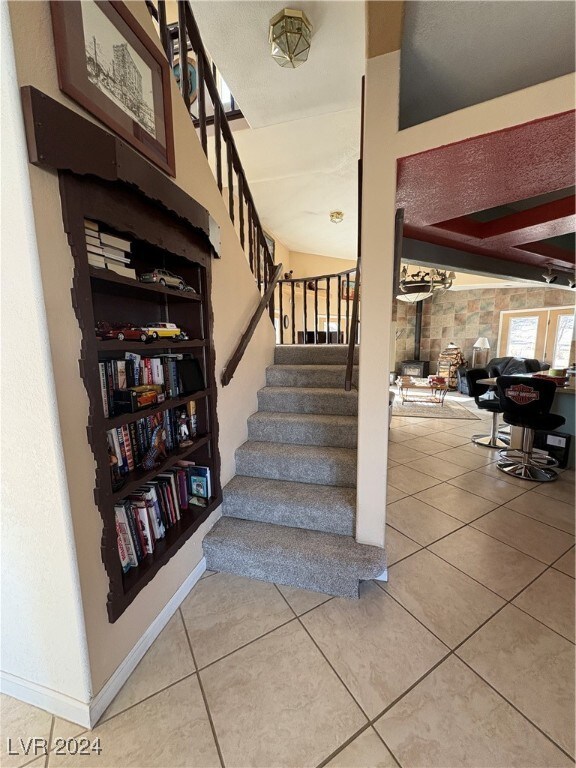 291E Madison Ave, Ely, NV 89301 - stairway with tile patterned flooring