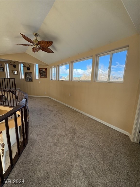 291E Madison Ave, Ely, NV 89301 - carpeted empty room featuring lofted ceiling, ceiling fan, and baseboards