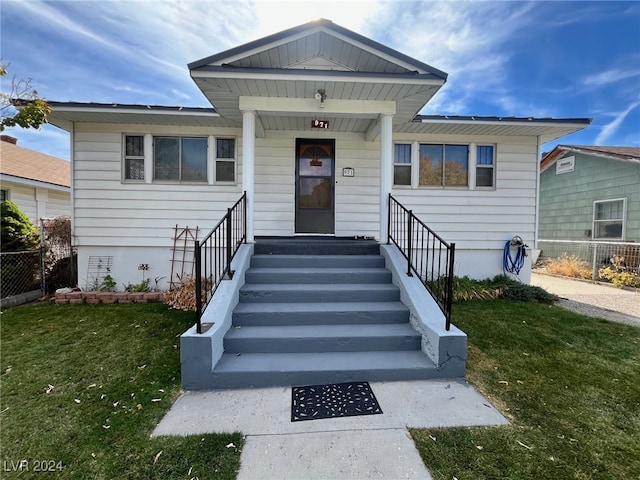 view of front of property with a front lawn